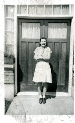Anne in front of St. Mary's Boys' Home in north Edmonton. 1942. Anne in front of St. Mary's Boys' Home in north Edmonton. 1942.