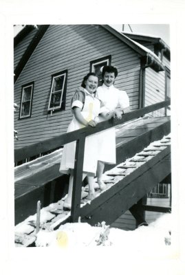 Anne with Anita (Mickey) McMahon, Father Howard McMahon's sister. Taken<br />at the old Athabasca hospital on 49th Street that later became the health unit. 1945. Anne with Anita (Mickey) McMahon, Father Howard McMahon's sister. Taken<br />at the old Athabasca hospital on 49th Street that later became the health unit. 1945.