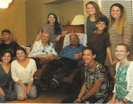 Charles and Rita and their nine grandchildren. Charles and Rita and their nine grandchildren.
