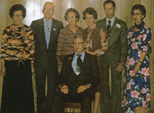 Bishell family all grown up. Date unknown. Joyce (sister),<br /> Vern (brother),<br /> Frances (sister), Ruth (sister), Alvin (brother), Edith Smiley, Walter James Bishell (dad) sitting. Bishell family all grown up. Date unknown. Joyce (sister),<br /> Vern (brother),<br /> Frances (sister), Ruth (sister), Alvin (brother), Edith Smiley, Walter James Bishell (dad) sitting.