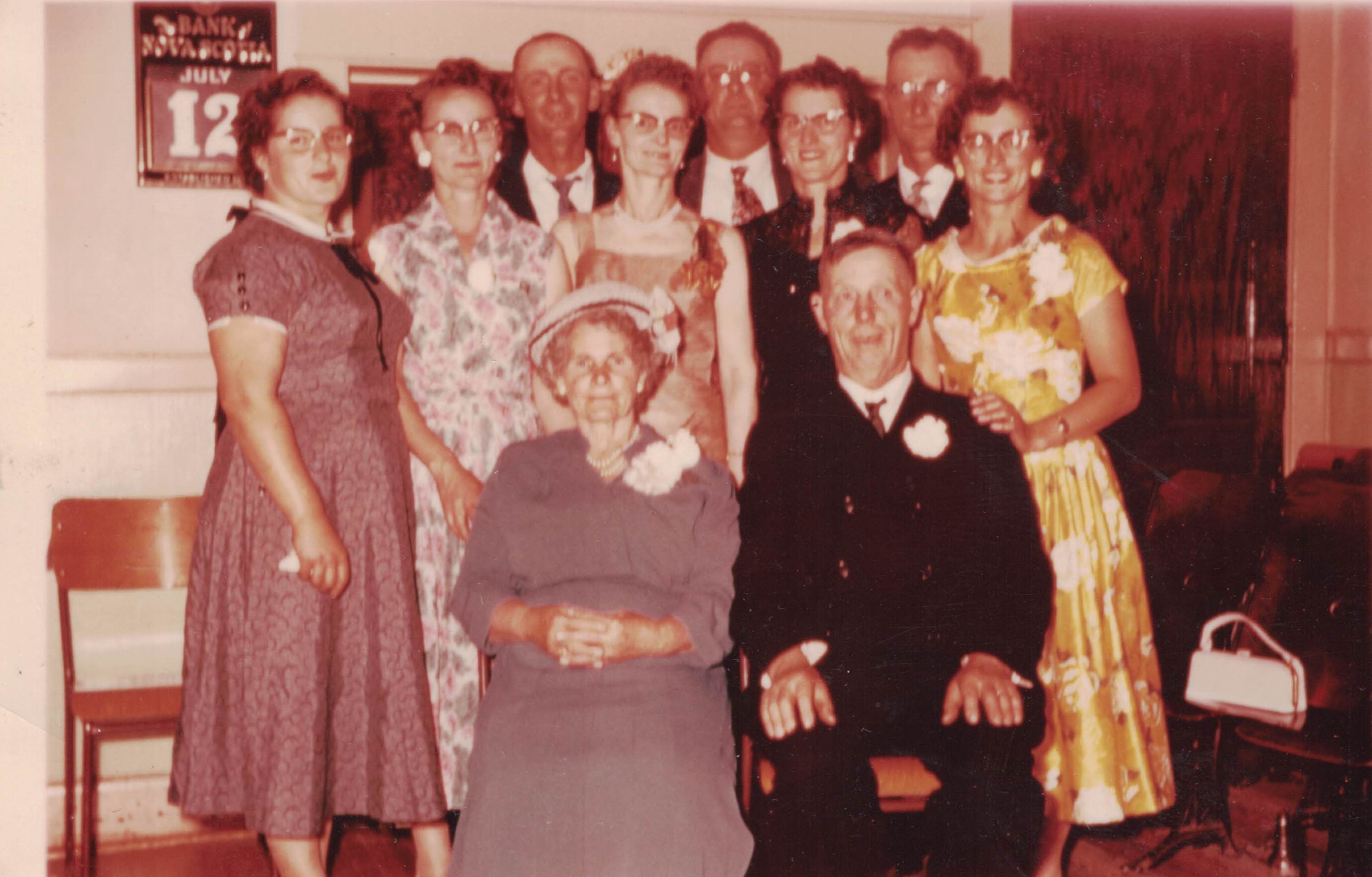 Bahry family. Back to front, left to right: George Bahry Jr., Joe Bahry, Bill Bahry, Josephine Onyschuk, Katie Kuzyk, Nancy Korenda, Annie Aitchison, Rosie Guay, Katherine Bahry, George Bahry Sr. Missing: Mary Philipzyk. Circa 1948. Bahry family. Back to front, left to right: George Bahry Jr., Joe Bahry, Bill Bahry, Josephine Onyschuk, Katie Kuzyk, Nancy Korenda, Annie Aitchison, Rosie Guay, Katherine Bahry, George Bahry Sr. Missing: Mary Philipzyk. Circa 1948.