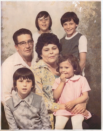 Rosie Foster with husband Spencer, and children. Back - Mark (glasses), Dean. Front - Karen. On lap - Nicole. Rosie Foster with husband Spencer, and children. Back - Mark (glasses), Dean. Front - Karen. On lap - Nicole.