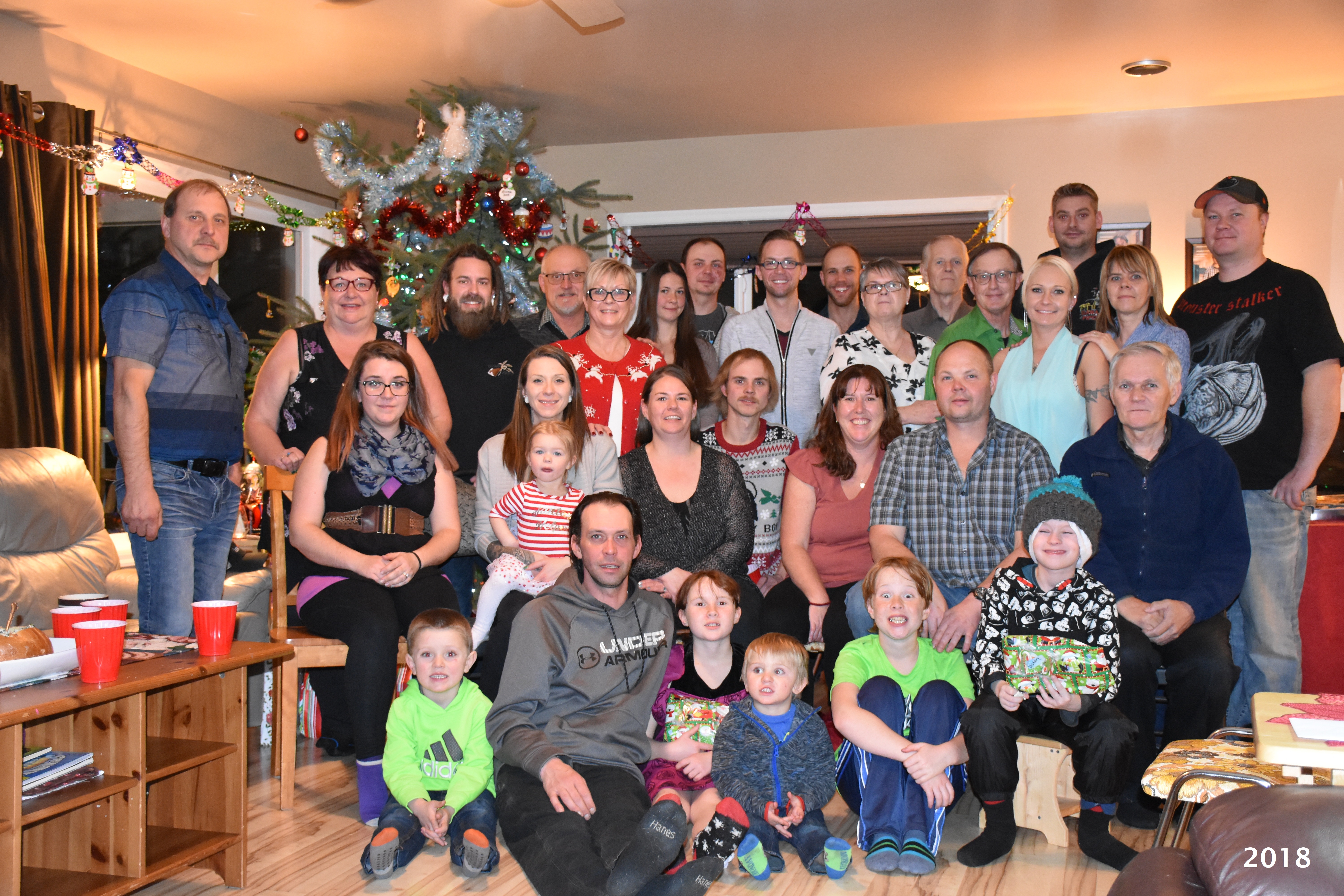 Christmas Eve 2018. Back row, left to right: Greg, Linda, Michael, Les, Bertha, Larissa, Vance, Jeffrey, Derrick, Grace, Marion, Ron, Jennifer, Landon (behind Jennifer), Marcia & Greg. Middle row, left to right: Hannah, Robyn holding Lenoxx, Tammy, Tyler, Cheryl, Marty & Philip. Front row, left to right: Zerrick, Kevin, Alana, Kayden, Brenden & Zachary. Christmas Eve 2018. Back row, left to right: Greg, Linda, Michael, Les, Bertha, Larissa, Vance, Jeffrey, Derrick, Grace, Marion, Ron, Jennifer, Landon (behind Jennifer), Marcia & Greg. Middle row, left to right: Hannah, Robyn holding Lenoxx, Tammy, Tyler, Cheryl, Marty & Philip. Front row, left to right: Zerrick, Kevin, Alana, Kayden, Brenden & Zachary.