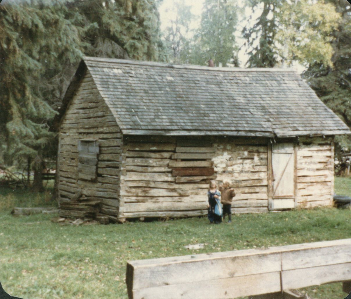 The original old house that the Turkawski family grew up in. Last lived in in 1956. Ted and Dorothy's children, Lara and Roland, in front. September 19, 1980. The original old house that the Turkawski family grew up in. Last lived in in 1956. Ted and Dorothy's children, Lara and Roland, in front. September 19, 1980.