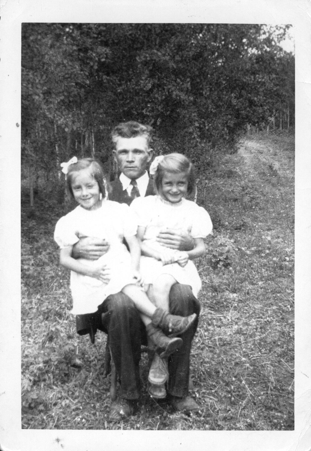 Ted's father, Dmytro Turkawski, and daughters Victoria and Evangeline. Circa 1943. Ted's father, Dmytro Turkawski, and daughters Victoria and Evangeline. Circa 1943.