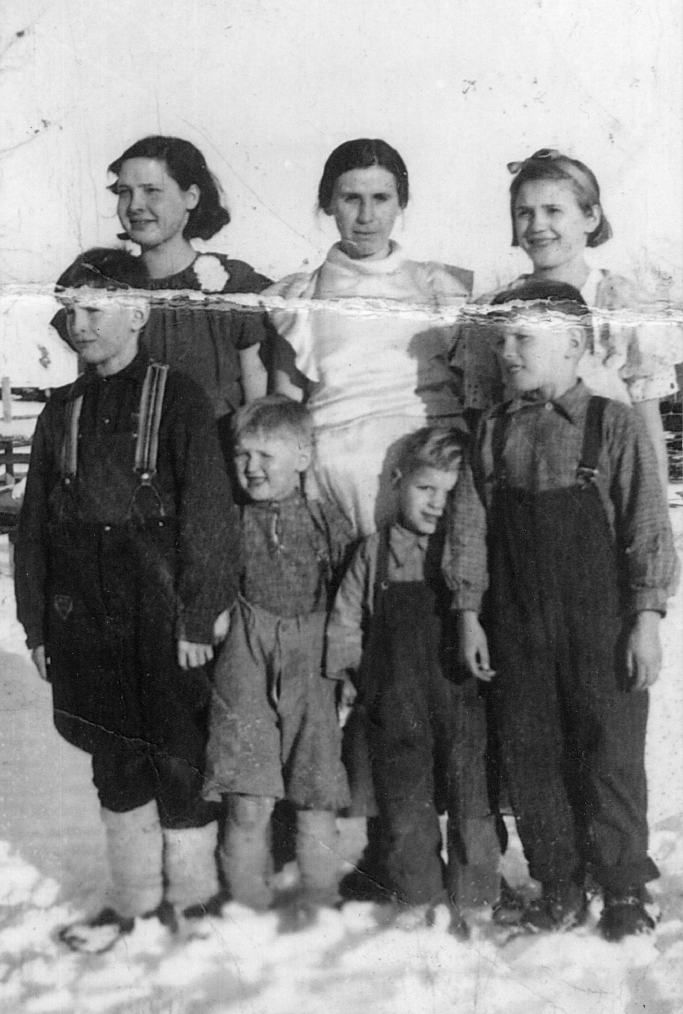 The Waschuk family. Back row, left to right: Lavina, Violet, Alexandra. Front row, left to right: Tom, John, William, Harry. 1936. The Waschuk family. Back row, left to right: Lavina, Violet, Alexandra. Front row, left to right: Tom, John, William, Harry. 1936.